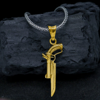 Sterling silver gun pendant from TRIBAL ORNAMENTS, unisex revolver jewelry, detailed and stylish accessory for gifting or personal style.