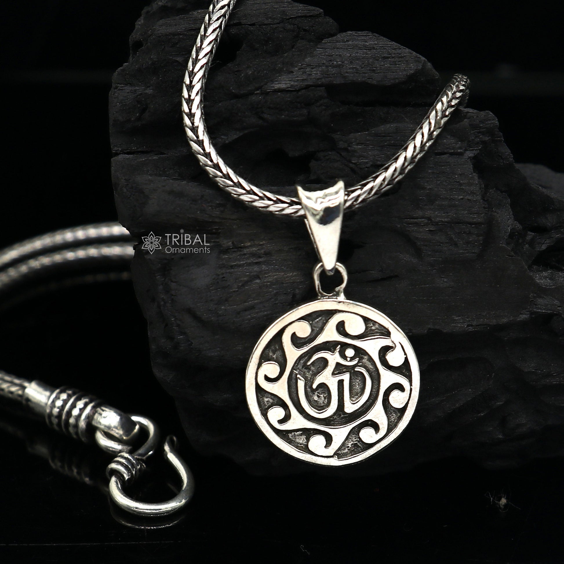 Sterling silver Divine 'Aum' OM pendant by TRIBAL ORNAMENTS, handcrafted tribal jewelry with good luck symbolism.