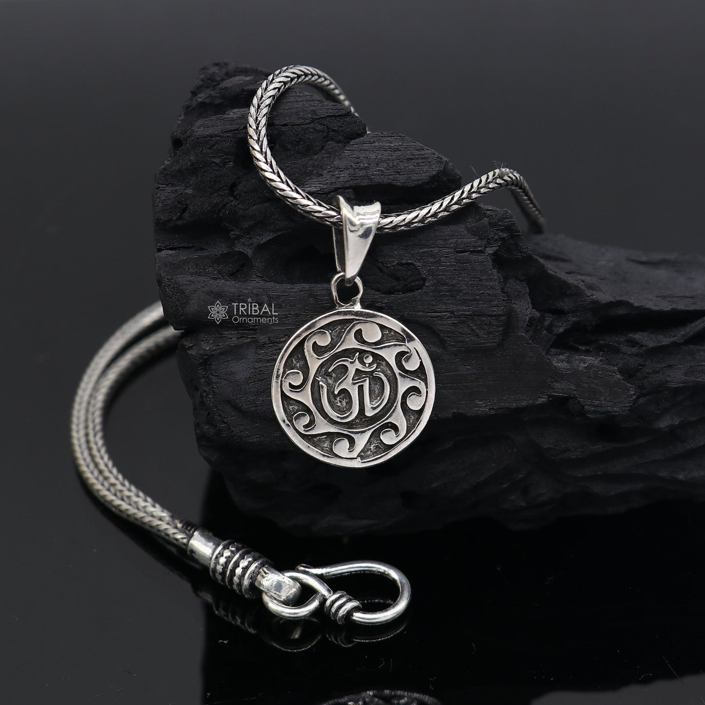 Sterling silver Divine 'Aum' OM pendant by Tribal Ornaments, handcrafted tribal jewelry with good luck symbolism.