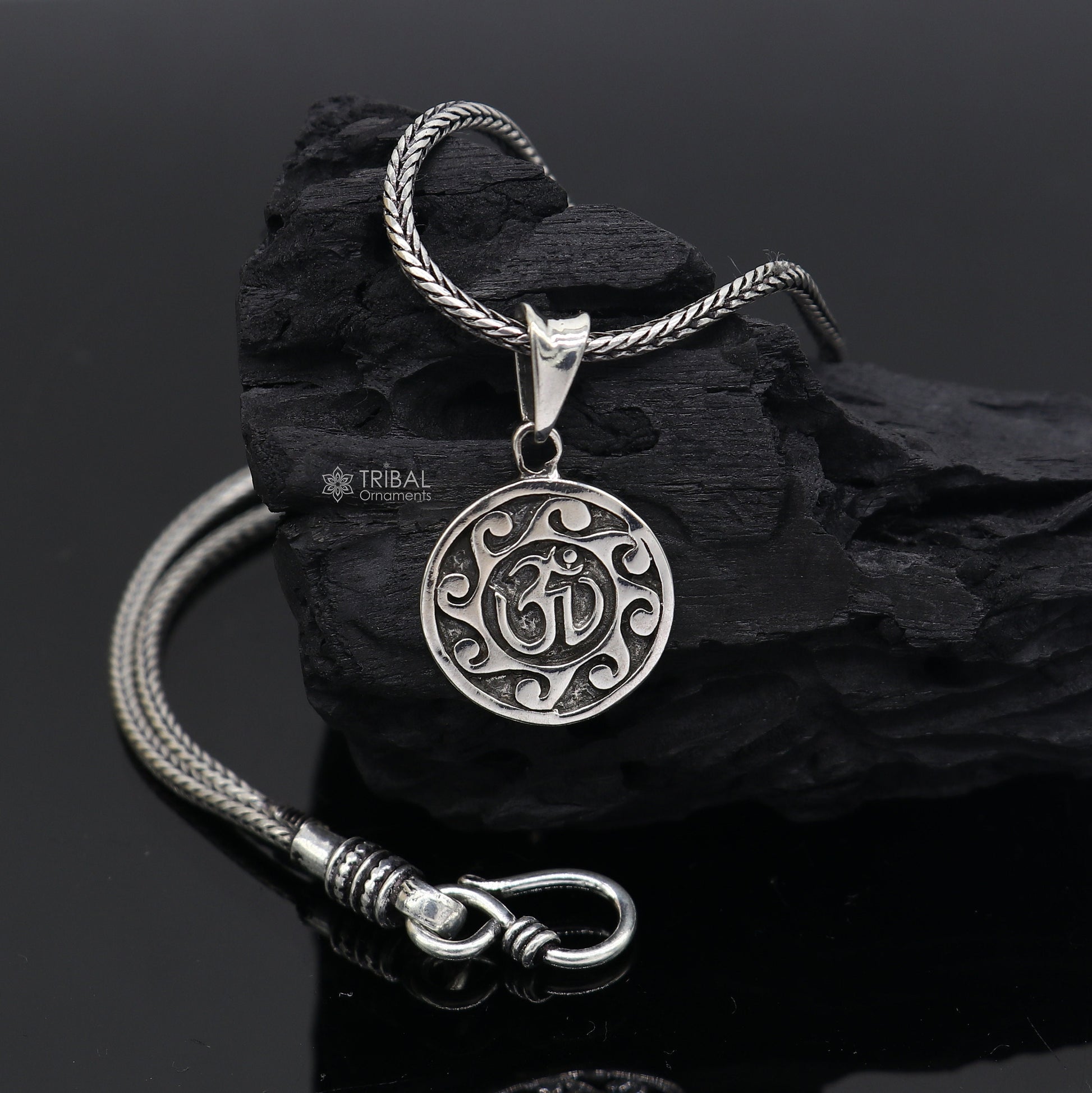 Sterling silver Divine 'Aum' OM pendant by Tribal Ornaments, handcrafted tribal jewelry with good luck symbolism.