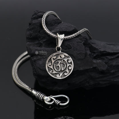 Sterling silver Divine 'Aum' OM pendant by Tribal Ornaments, handcrafted tribal jewelry with good luck symbolism.