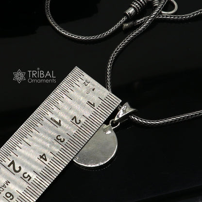 Sterling silver Divine Aum OM pendant by Tribal Ornaments, handmade tribal jewelry with good luck symbolism.