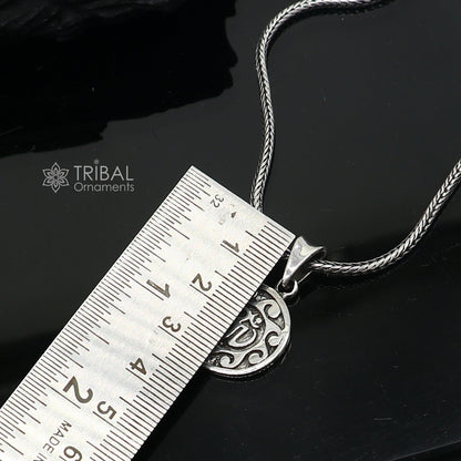 Sterling silver Divine Aum OM pendant from TRIBAL ORNAMENTS, handmade tribal jewelry with good luck symbolism and intricate tribal design.