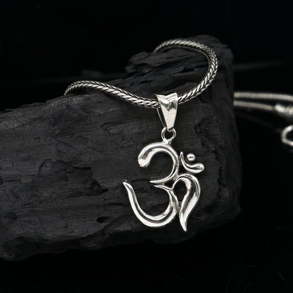 925 sterling silver Divine Aum OM pendant from TRIBAL ORNAMENTS, featuring a tribal-style good luck jewelry design.