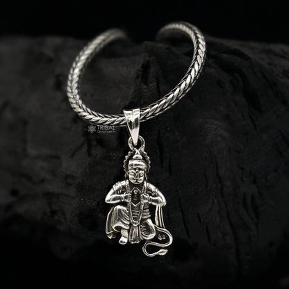 Sterling silver Lord Hanuman pendant by Tribal Ornaments, unisex handmade Hindu jewelry featuring divine Lord Bajarangbali design.