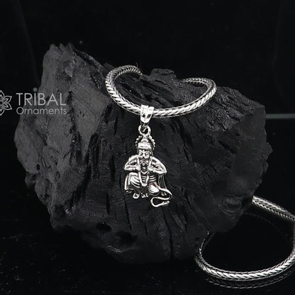 Sterling silver Lord Hanuman pendant by Tribal Ornaments, handmade unisex Hindu jewelry with intricate divine design.