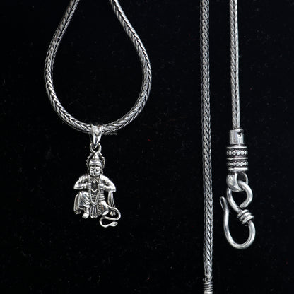 Sterling silver Lord Hanuman pendant from Tribal Ornaments, handmade Hindu idol jewelry for unisex gifting.