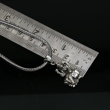 Sterling silver goddess Saraswati or Sharda pendant, handmade tribal jewelry, featuring intricate design for students.