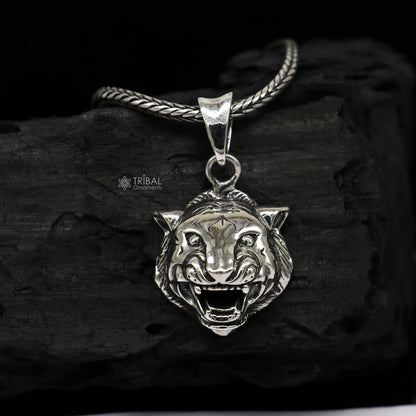 Sterling silver lion face pendant by TRIBAL ORNAMENTS symbolizing courage, strength, and leadership in detailed craftsmanship.