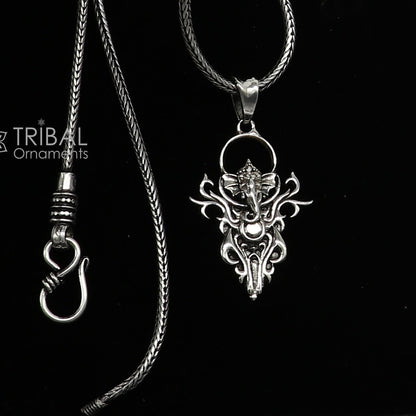 Sterling silver Lord Ganesha pendant by Tribal Ornaments, unisex handmade jewelry with intricate Ganesha design.
