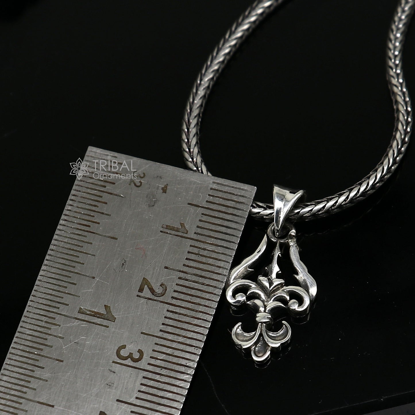Sterling silver Lord Shiva Trident Trishul pendant, unisex jewelry by Tribal Ornaments, featuring intricate design on a silver necklace.