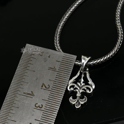 Sterling silver Lord Shiva Trident Trishul pendant, unisex jewelry by Tribal Ornaments, featuring intricate design on a silver necklace.