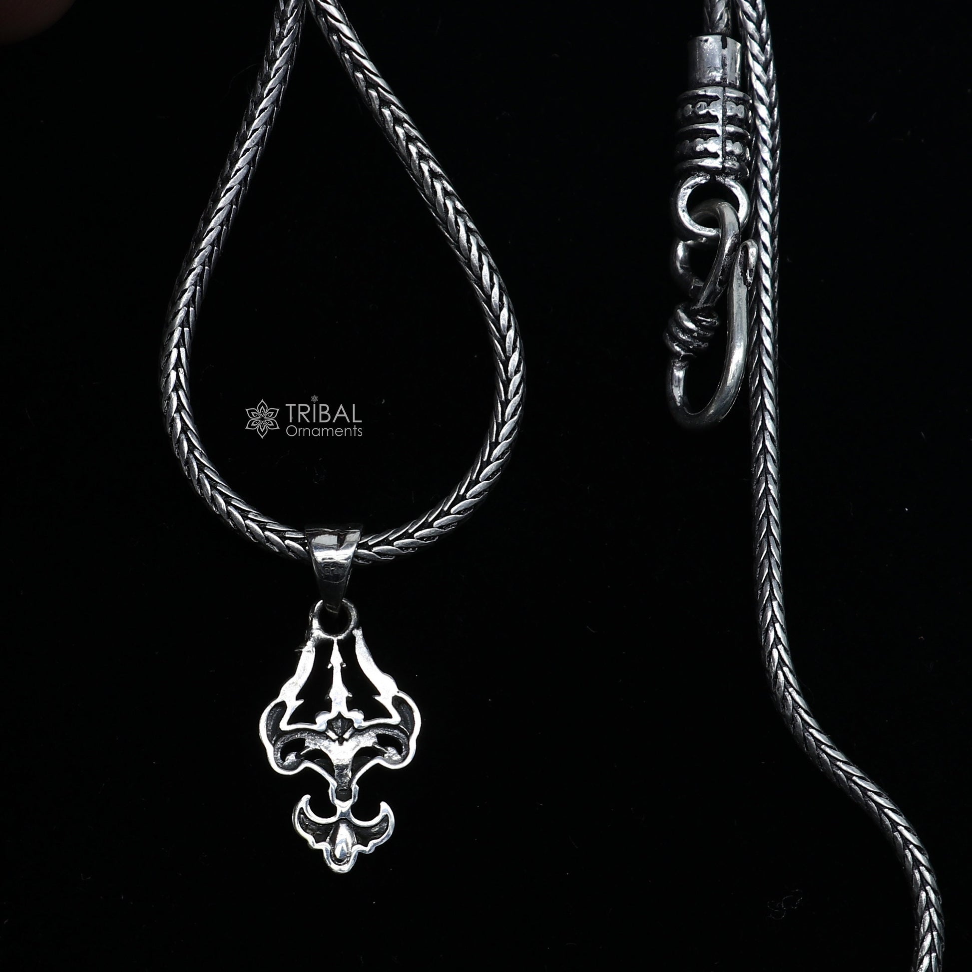 Sterling silver Lord Shiva Trident Trishul pendant, unisex jewelry by Tribal Ornaments, featuring intricate design and high-quality craftsmanship.