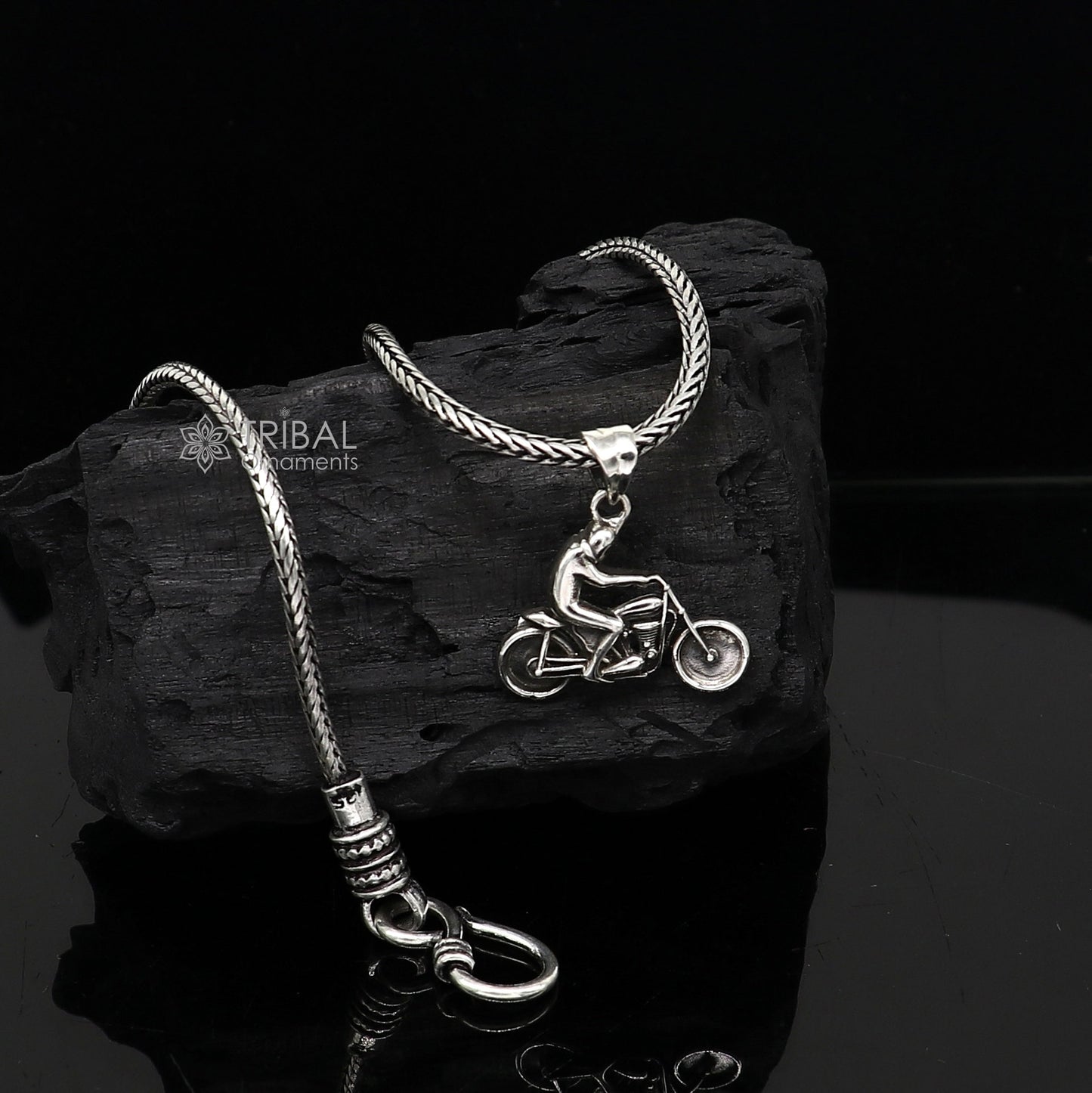 Sterling silver Royal Enfield bike pendant by Tribal Ornaments, detailed motorcycle charm for bike lovers, high-quality silver necklace.