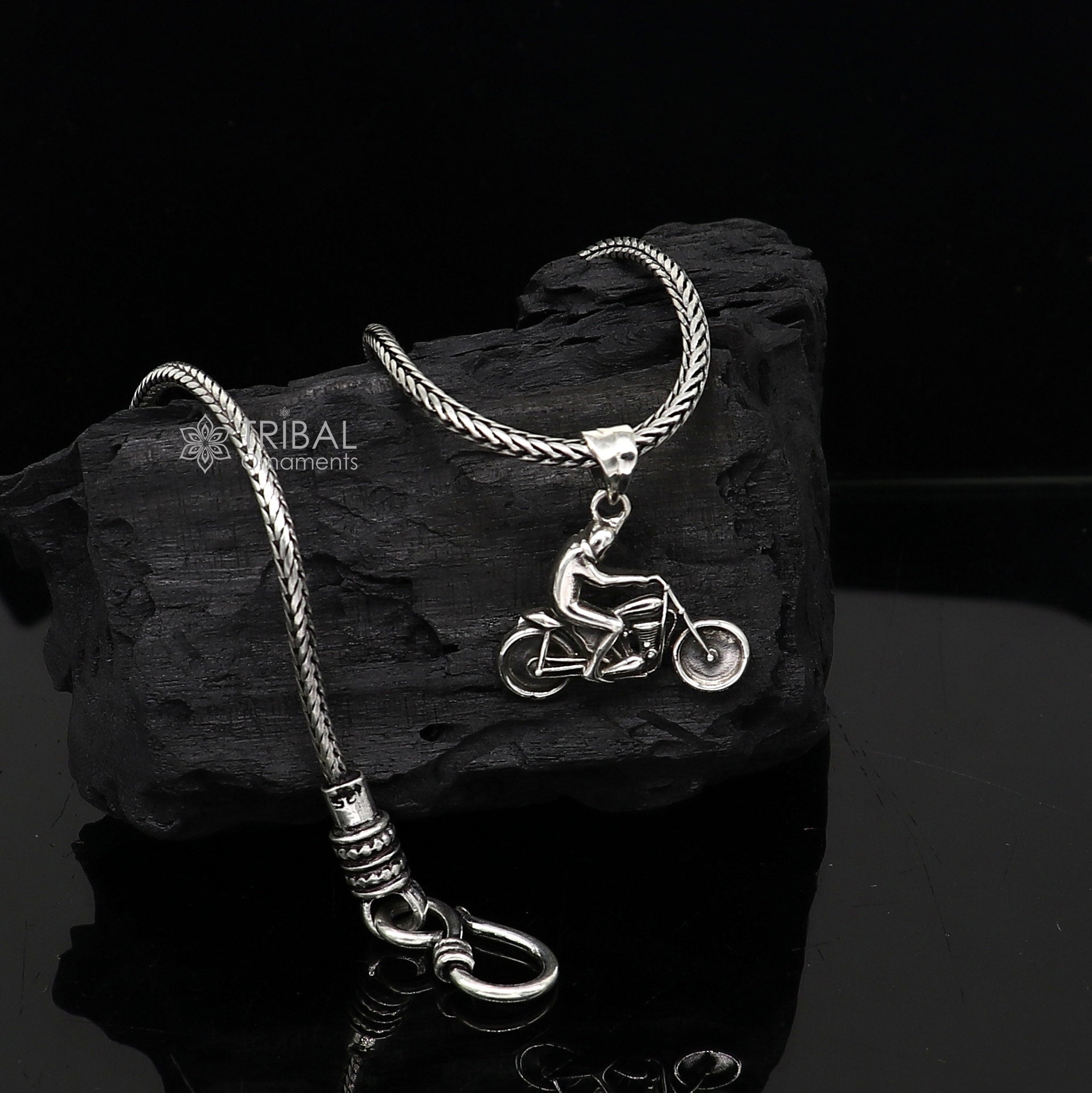 Sterling silver Royal Enfield bike pendant by Tribal Ornaments, detailed motorcycle charm for bike lovers, high-quality silver necklace.
