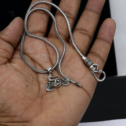 Sterling silver Royal Enfield bike pendant by Tribal Ornaments, detailed motorcycle design for bike lovers, high-quality jewelry accessory.