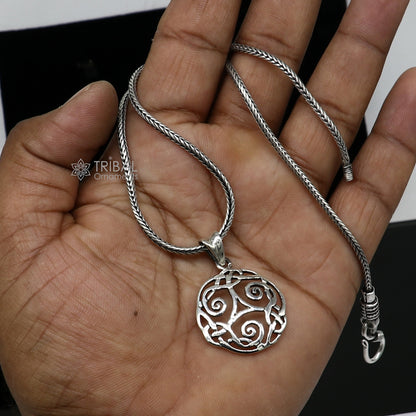 Sterling silver Celtic Triskelion pendant by Tribal Ornaments, stylish 925 silver necklace with intricate tribal design.