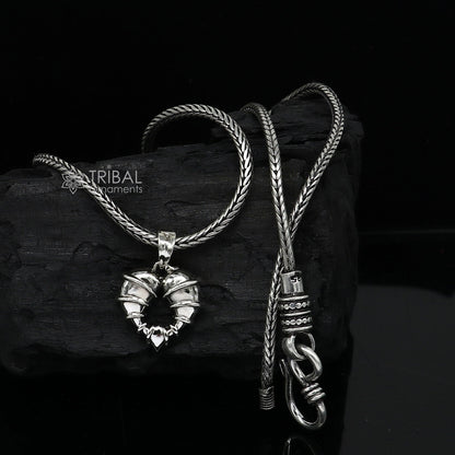 Sterling silver heart-shaped pendant necklace by Tribal Ornaments, featuring a unique design perfect for gifting jewelry.