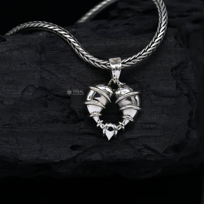 Sterling silver heart-shaped pendant jewelry by TRIBAL ORNAMENTS, featuring a unique design, ideal for gifting or everyday wear.