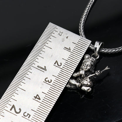 Sterling silver Lord Krishna Makhan Gopala pendant necklace, delicate tribal jewelry with intricate design, perfect for daily wear.