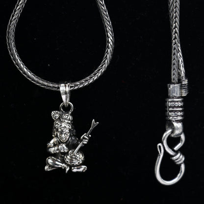 Delicate 925 sterling silver Lord Krishna Makhan Gopala pendant necklace showcasing intricate tribal jewelry design.
