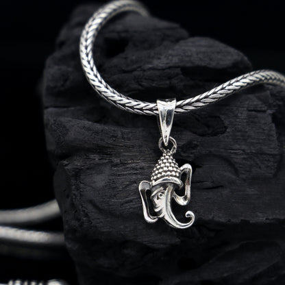 Stylish 925 sterling silver Lord Ganesha pendant, unisex handmade jewelry with intricate design from TRIBAL ORNAMENTS.