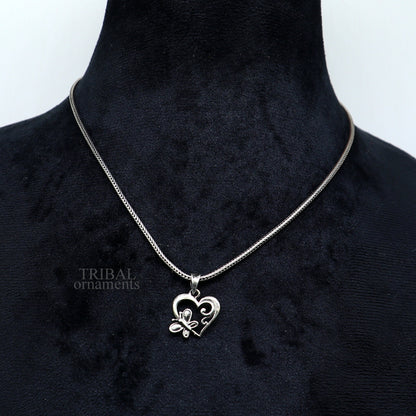 Sterling silver heart pendant by TRIBAL ORNAMENTS, stylish unisex personalized jewelry with intricate design, perfect as a gift.