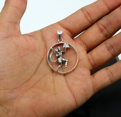 Sterling silver Lord Hanuman flying pendant featuring intricate Hindu deity design, unisex jewelry from Tribal Ornaments.