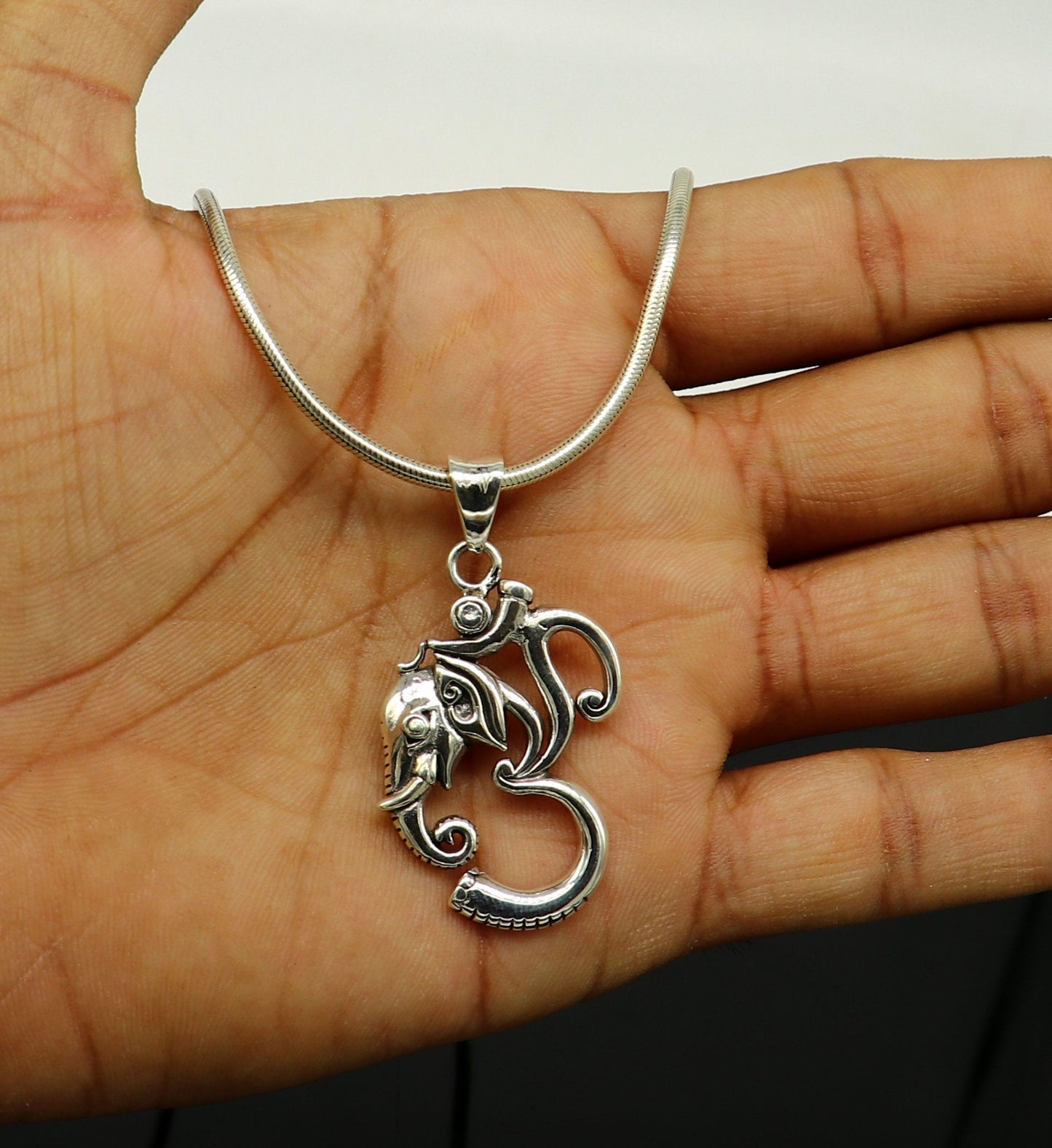 Sterling silver vintage Aum Ganesha pendant, handmade unisex jewelry, stylish tribal ornament, personalized jewelry design.