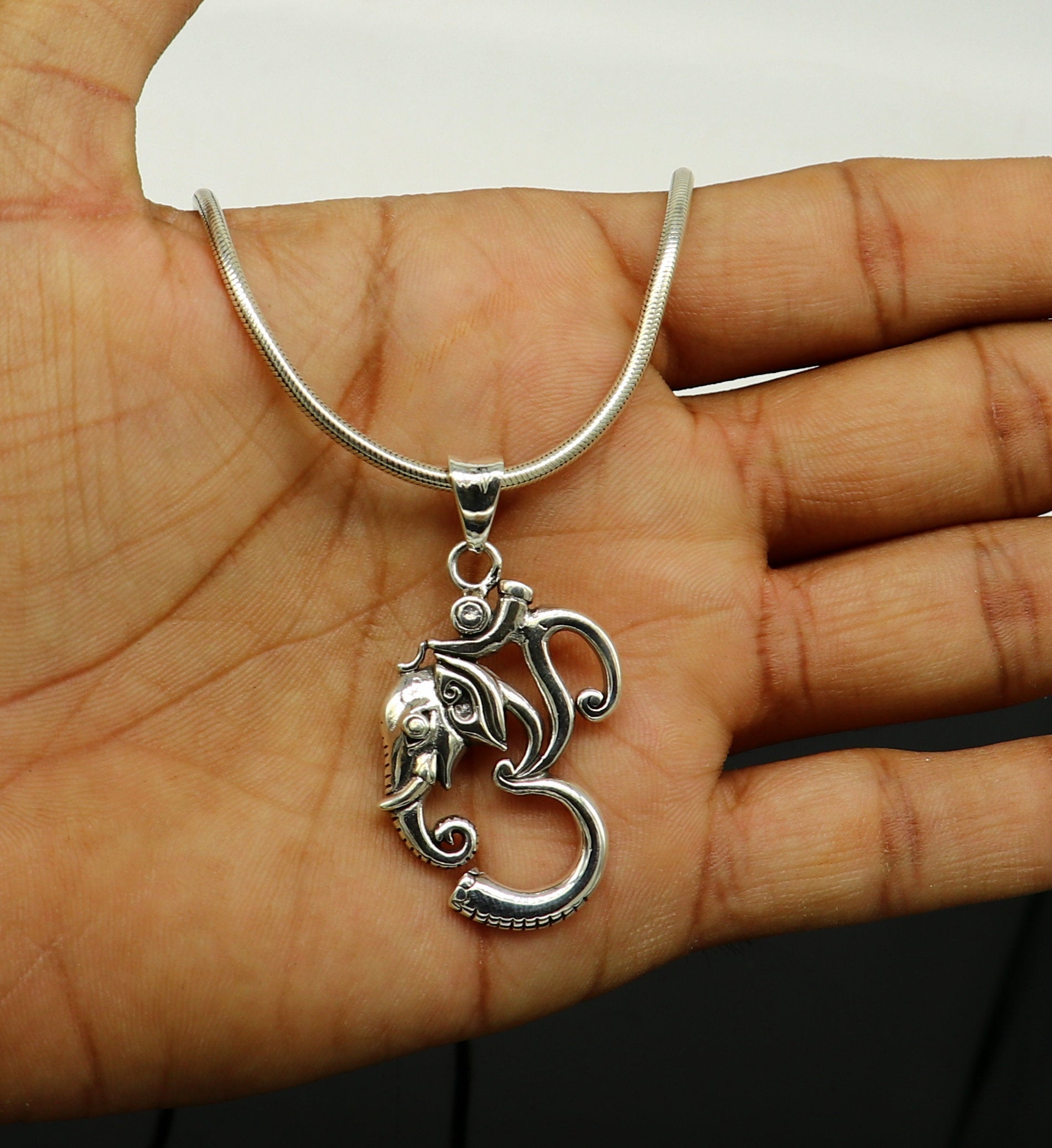 Sterling silver vintage Aum Ganesha pendant, handmade unisex jewelry, stylish tribal ornament, personalized jewelry design.