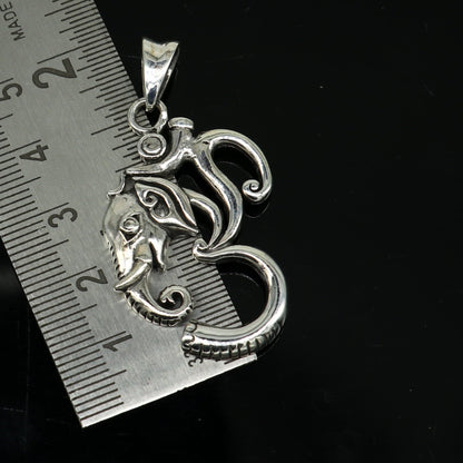Sterling silver vintage Aum Ganesha pendant by TRIBAL ORNAMENTS, handcrafted unisex jewelry featuring intricate design and personalized style.