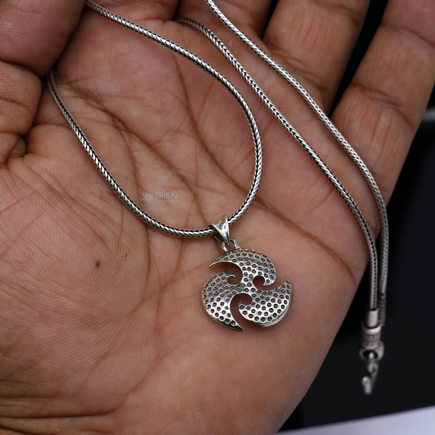 Sterling silver Ninza design Triskelion pendant from Tribal Ornaments, featuring handmade tribal craftsmanship for boys and girls.