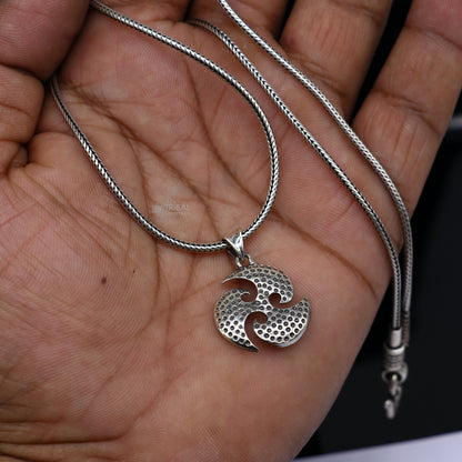 Sterling silver Ninza design Triskelion pendant from Tribal Ornaments, featuring handmade tribal craftsmanship for boys and girls.
