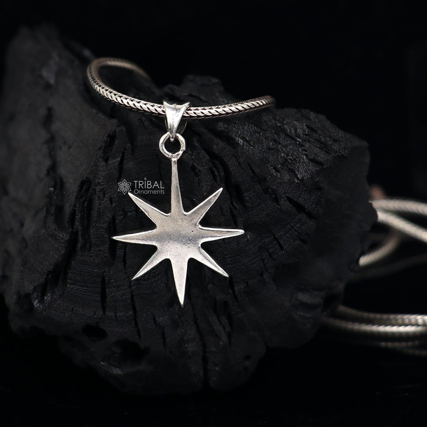 Sterling silver star pendant for boys and girls, handmade by Tribal Ornaments, featuring a stylish, small star design.