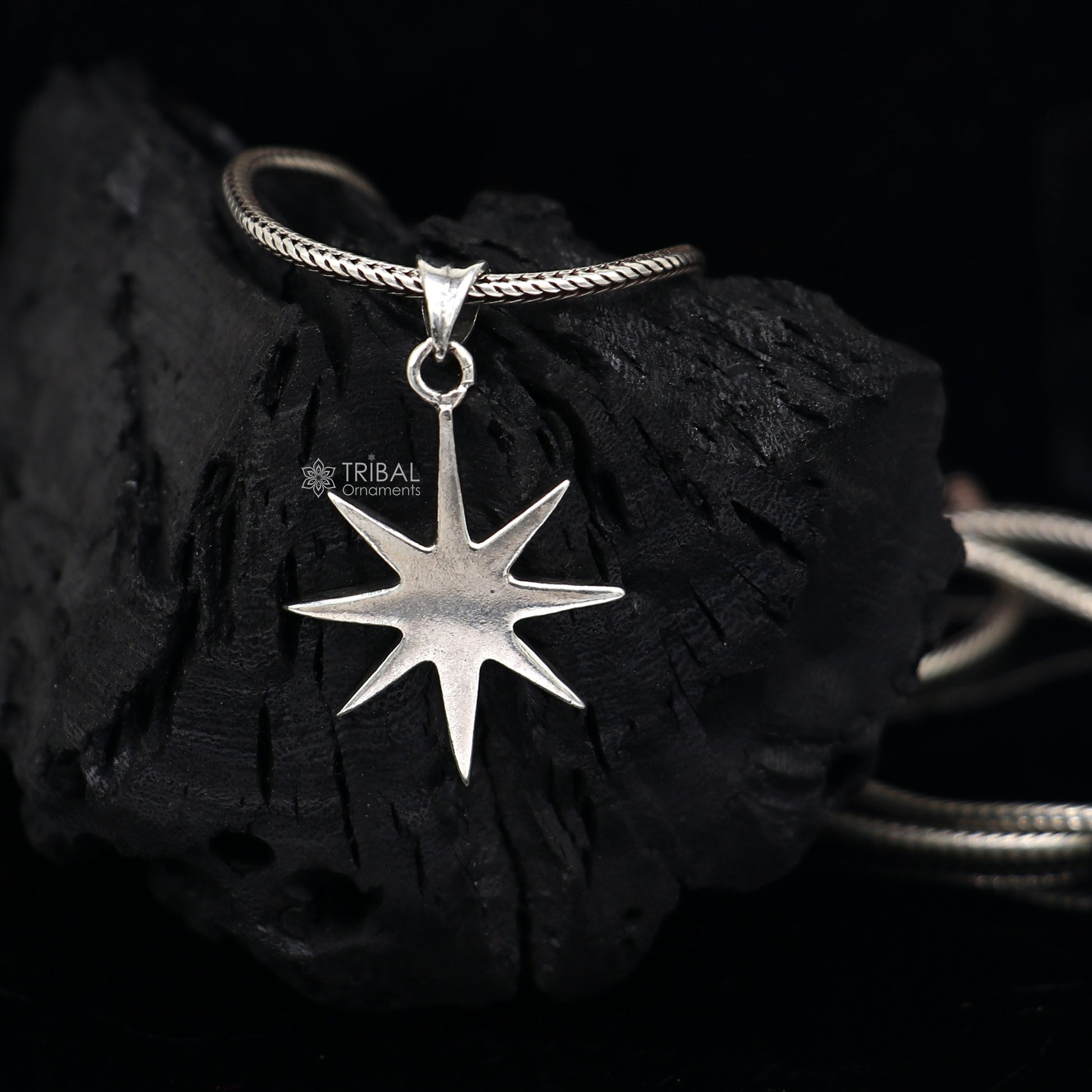 Sterling silver star pendant for boys and girls, handmade by Tribal Ornaments, featuring a stylish, small star design.