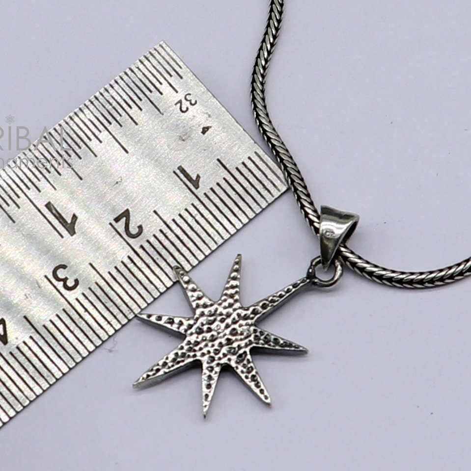Sterling silver star pendant for boys and girls by Tribal Ornaments, handmade jewelry with a stylish design.