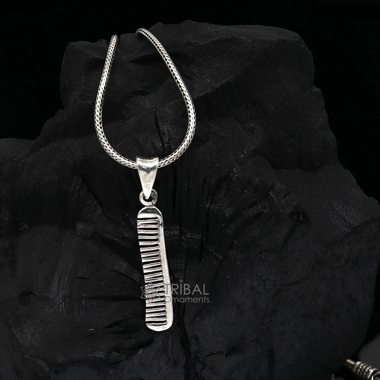 Sterling silver hair comb pendant from Tribal Ornaments, stylish customized jewelry with intricate tribal design.