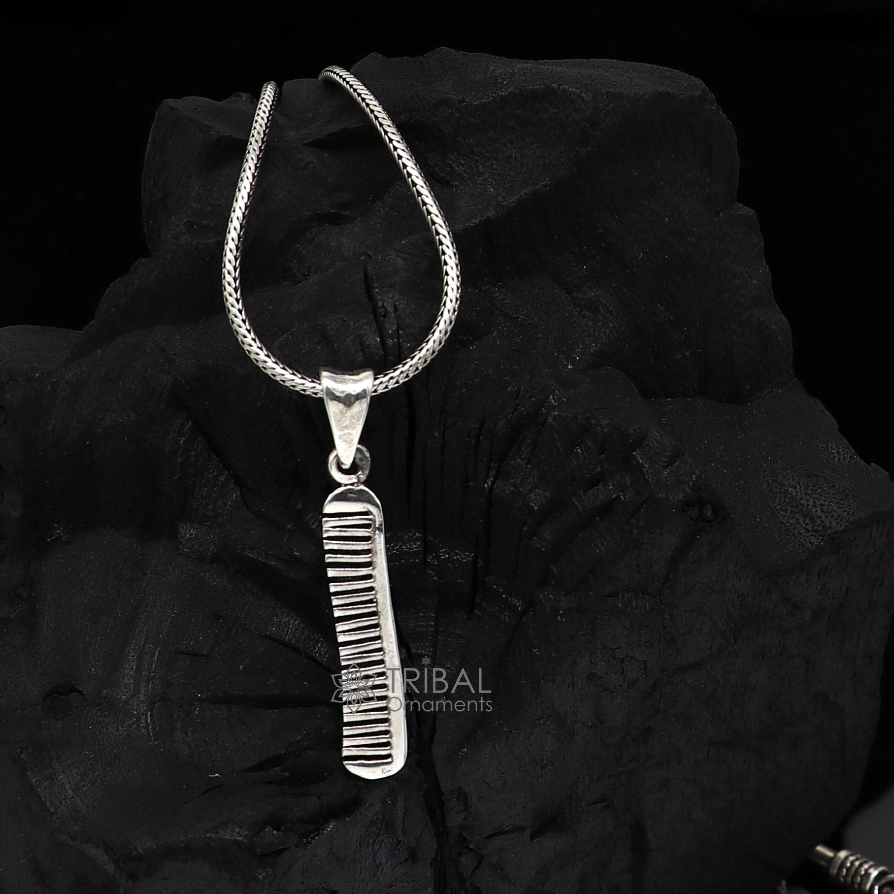 Sterling silver hair comb pendant from Tribal Ornaments, stylish customized jewelry with intricate tribal design.