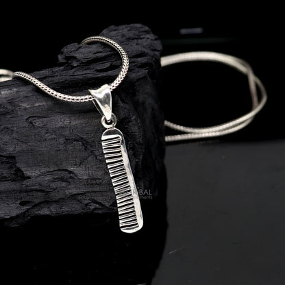 Sterling silver hair comb pendant from TRIBAL ORNAMENTS, stylish customized jewelry with intricate tribal design.