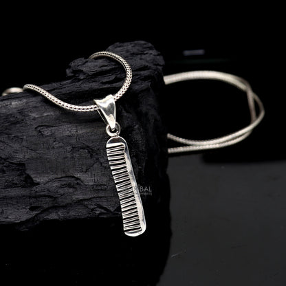 Sterling silver hair comb pendant from TRIBAL ORNAMENTS, stylish and customized jewelry with intricate tribal design.