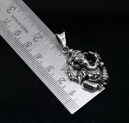 Unisex 925 sterling silver Lord Ganesha pendant from TRIBAL ORNAMENTS, featuring intricate handcrafted tribal design.