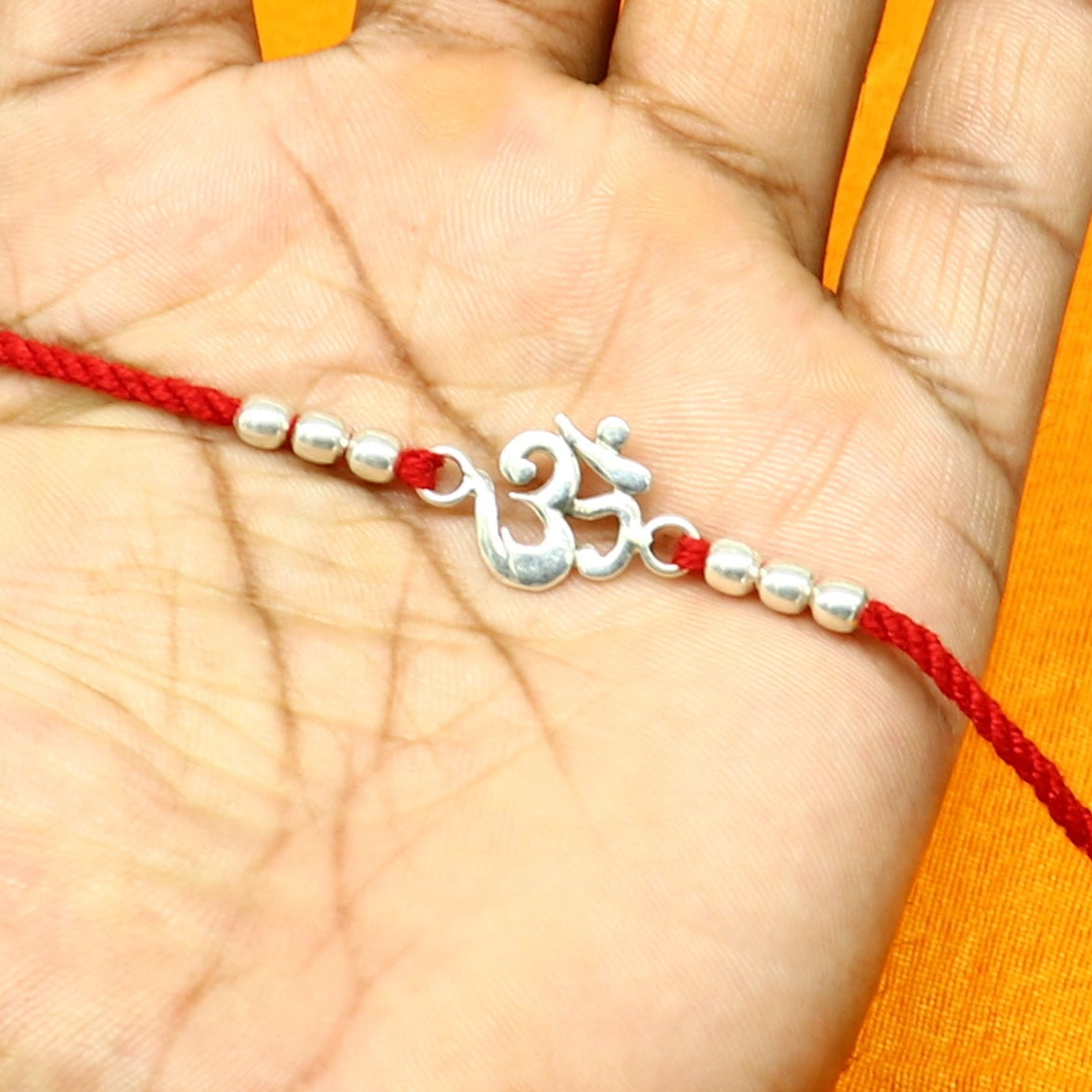 925 sterling silver custom design fabulous symbol OM or AUM design Rakhi bracelet with red thread Best sibling rakhi rk174 - TRIBAL ORNAMENTS
