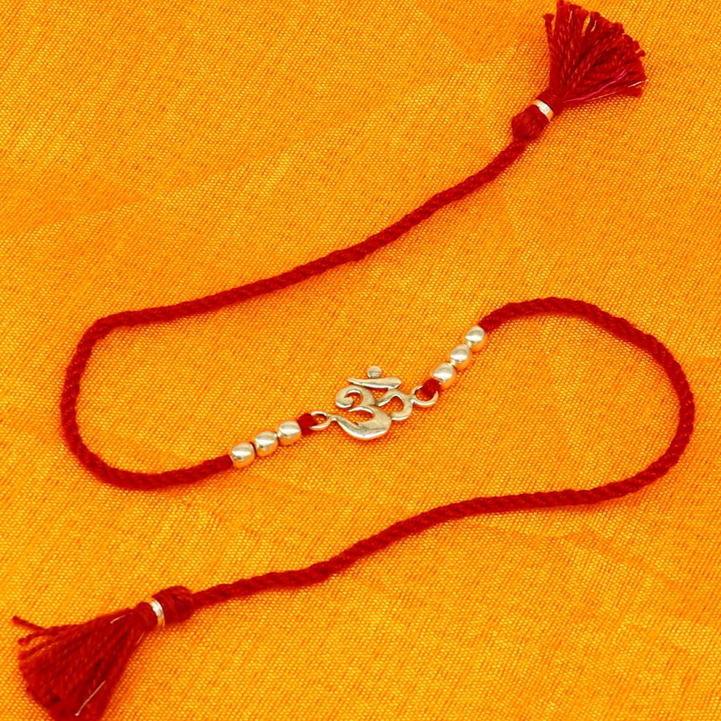 925 sterling silver custom design fabulous symbol OM or AUM design Rakhi bracelet with red thread Best sibling rakhi rk174 - TRIBAL ORNAMENTS