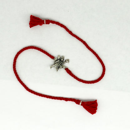Sterling silver Flying Hanuman idol bracelet with red thread rakhi, tribal ornaments design, traditional Hindu festival accessory