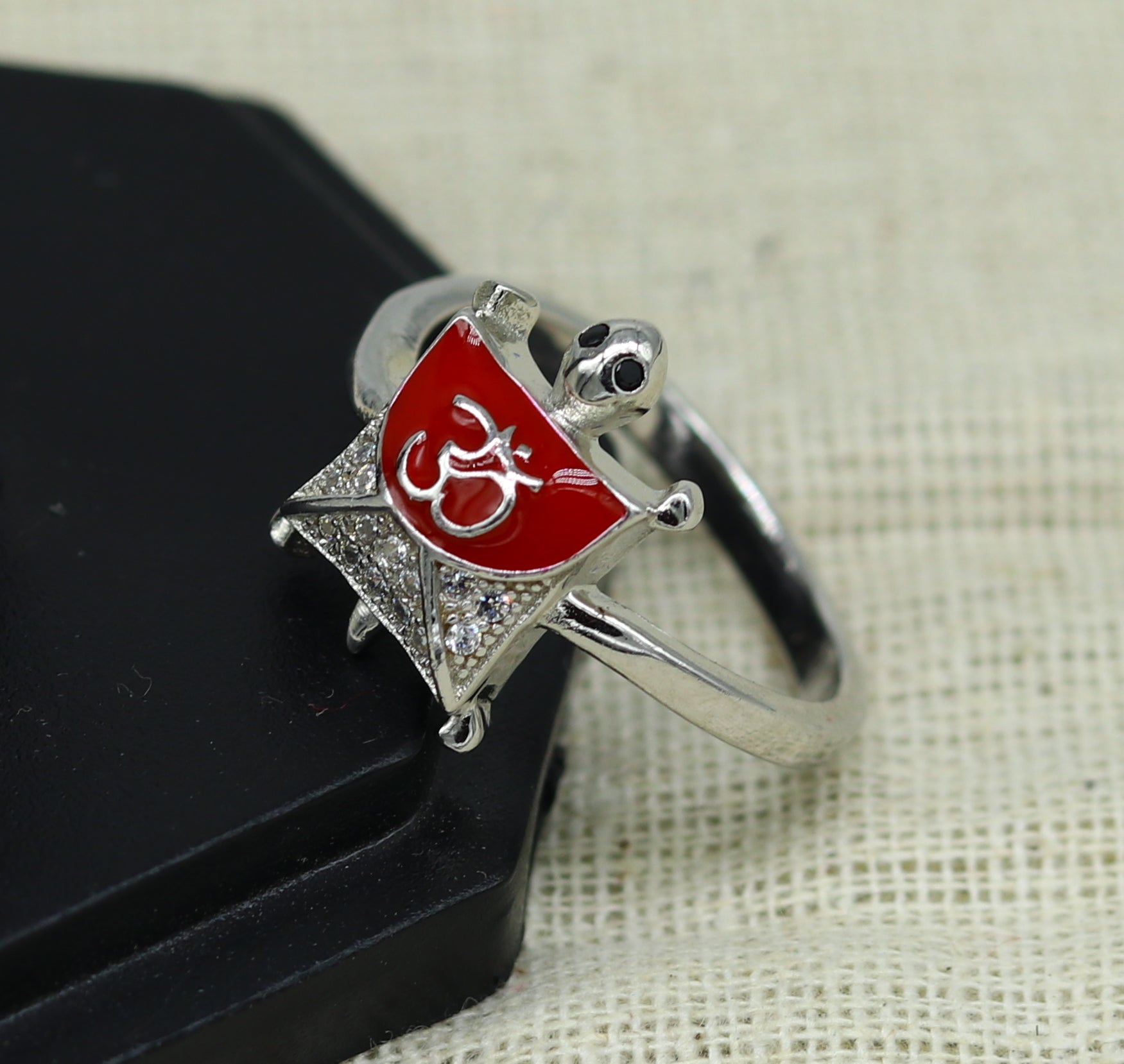 Red 925 Sterling silver tortoise ring with OM symbol and AD stone, elegant unisex design perfect for gifting by Tribal Ornaments.