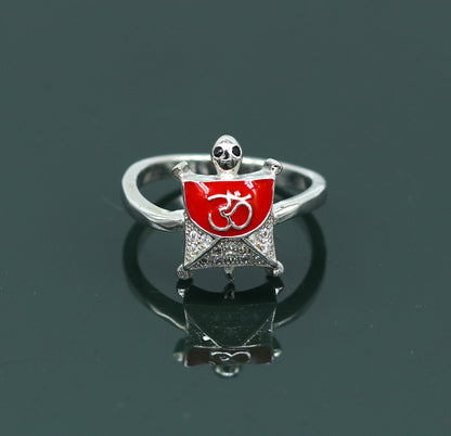 Red 925 sterling silver tortoise ring with OM blessing symbol, featuring an AD stone, elegant unisex jewelry by Tribal Ornaments.