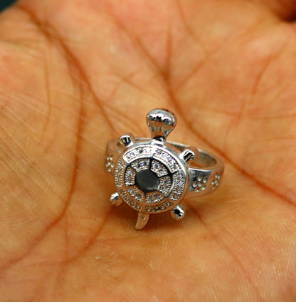 Sterling silver tortoise ring with AD stone, stylish unisex design, featuring intricate patterns and a polished finish.