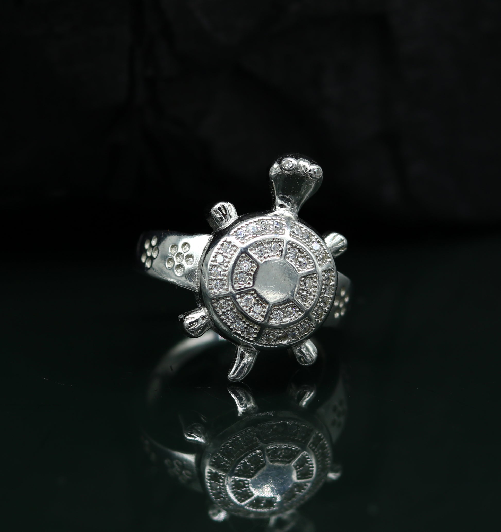 Sterling silver tortoise ring with intricate design, featuring an AD stone, unisex style, from TRIBAL ORNAMENTS.