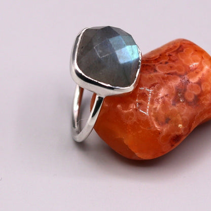 Sterling silver unisex band ring with vibrant blue fire labradorite stone, crafted by Tribal Ornaments.
