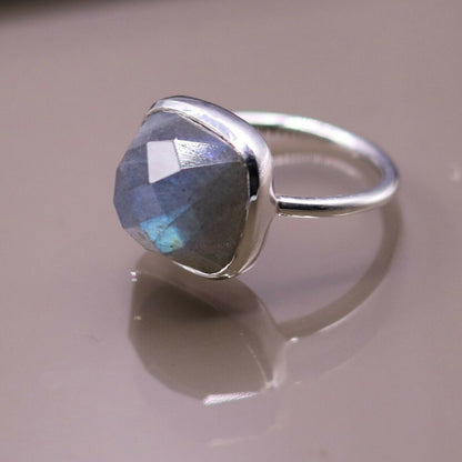 Sterling silver unisex band ring with vibrant blue fire labradorite gemstone, crafted by Tribal Ornaments.